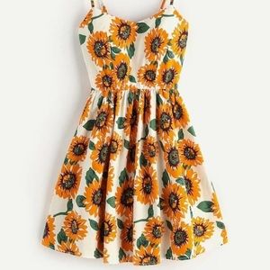 Sunflower Printed Sundress. Tie straps & cross cross back. Padded bust.